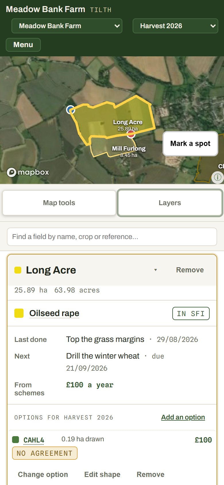 The map on a phone: a field outlined over satellite imagery with its card open underneath.